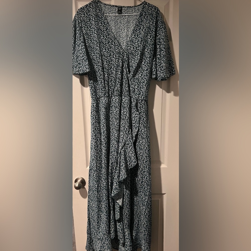 Floral print dark teal dress.